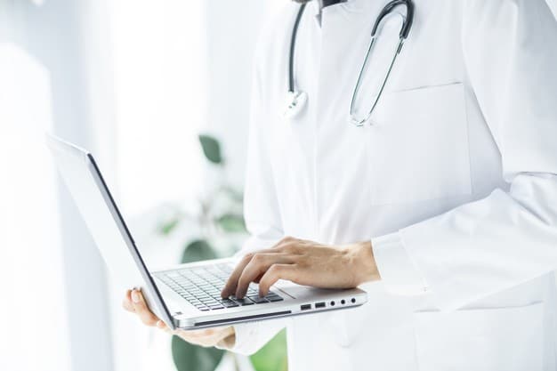 doctor using laptop